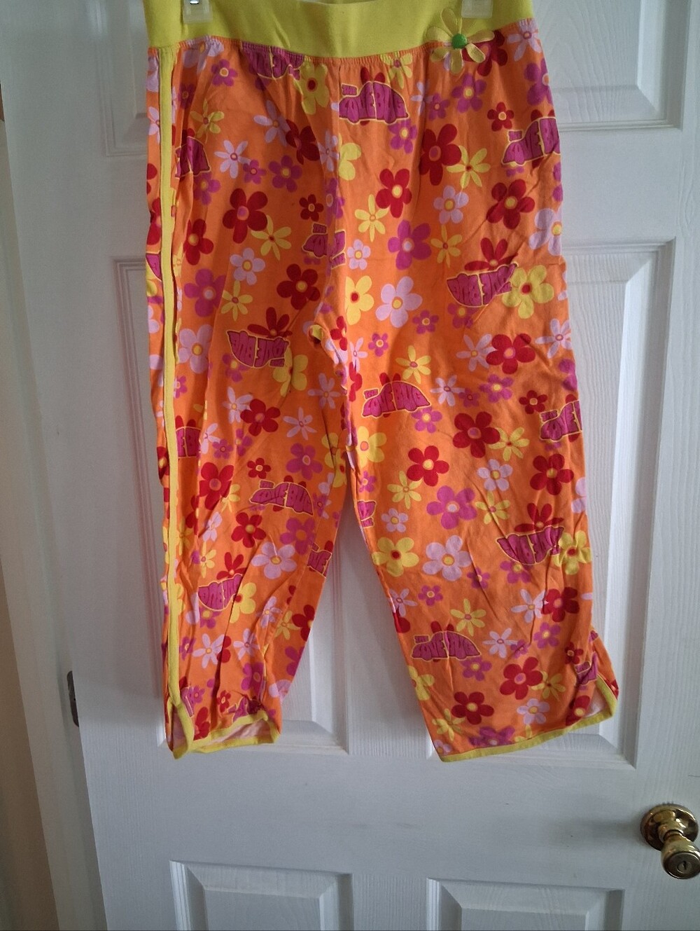 Women’s Orange Floral Capris with Yellow Waistband